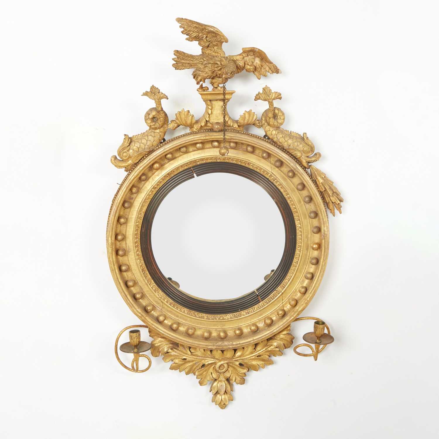 Lot 514 - Regency Giltwood and Ebonized Convex Girandole Mirror