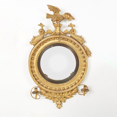 Lot 514 - Regency Giltwood and Ebonized Convex Girandole Mirror