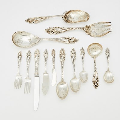 Lot 297 - Reed & Barton Sterling Silver “Love Disarmed” Pattern Flatware Service