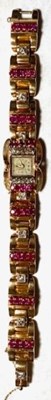 Lot 1059 - Gold, Ruby and Diamond Bracelet-Watch