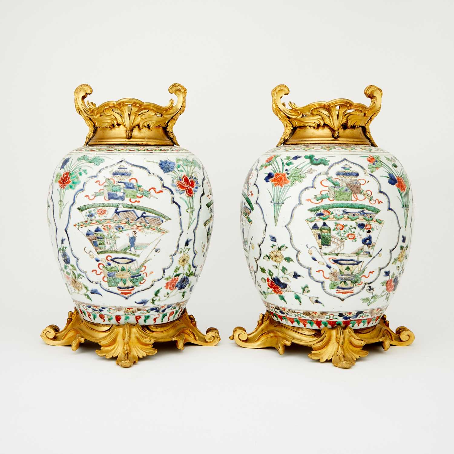 Lot 104 - Pair of Chinese Wucai Decorated Gilt-Bronze Mounted Porcelain Jars