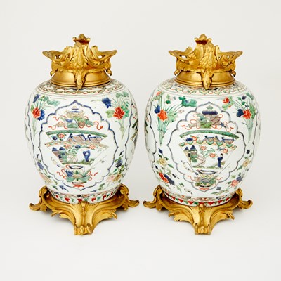 Lot 104 - Pair of Chinese Wucai Decorated Gilt-Bronze Mounted Porcelain Jars