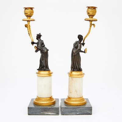 Lot 129 - Pair of Regency Ormolu and Patinated-Bronze Figural Candlesticks