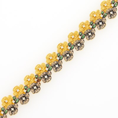 Lot 2157 - Two-Color Gold, Diamond, Colored Diamond and Gem-Set Flower Bracelet