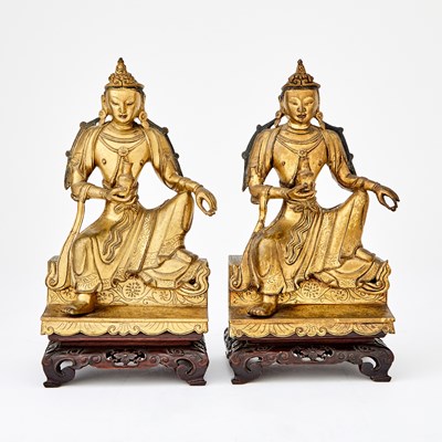 Lot 318 - A Matched Pair of Sino-Tibetan Gilt Bronze Figures of Guanyin