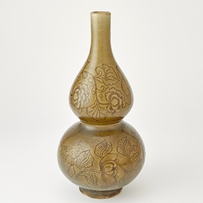 Lot 690 - A Chinese Glazed Celadon Double Gourd Vase