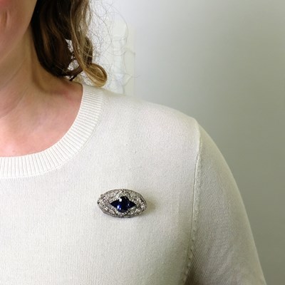 Lot 171 - Belle Époque Platinum, Color-Change Sapphire, Sapphire and Diamond Brooch