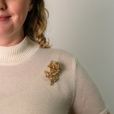 Lot 119 - Gold and Diamond Flower Brooch