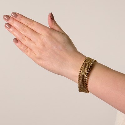 Lot 149 - Gubelin Gold Bracelet-Watch