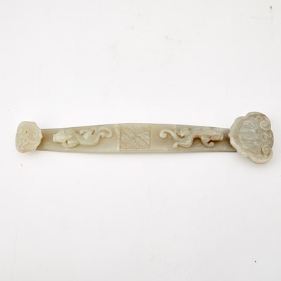 Lot 423 - A Chinese Celadon Jade Ruyi Scepter