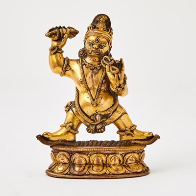 Lot 320 - A Nepalese Silver Inlaid Gilt Bronze Figure of Vajrapani