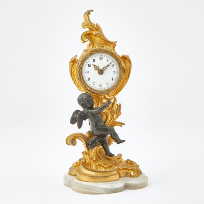 Lot 369 - Rococo Style Gilt and Patinated Bronze Small Clock