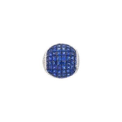 Lot 1066 - White Gold, Invisibly-Set Sapphire and Diamond Bombé Ring