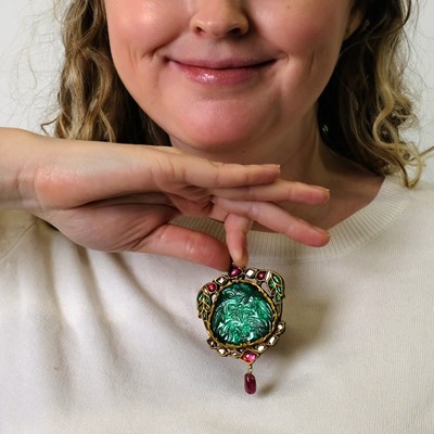 Lot 182 - Indian Gold, Carved Foil-Backed Emerald, Ruby, Emerald and Diamond and Ruby Bead Pendant