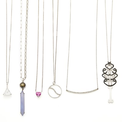 Lot 2291 - Four White Gold, Silver, Diamond, Black Diamond, Cubic Zirconia and Pink Sapphire Pendant-Necklaces