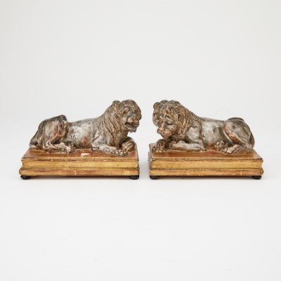 Lot 725 - Pair of Italian Silvered and Giltwood Recumbent Lions