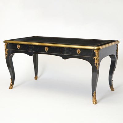 Lot 290 - Louis XV Style Gilt-Metal Mounted Ebonized Bureau Plat