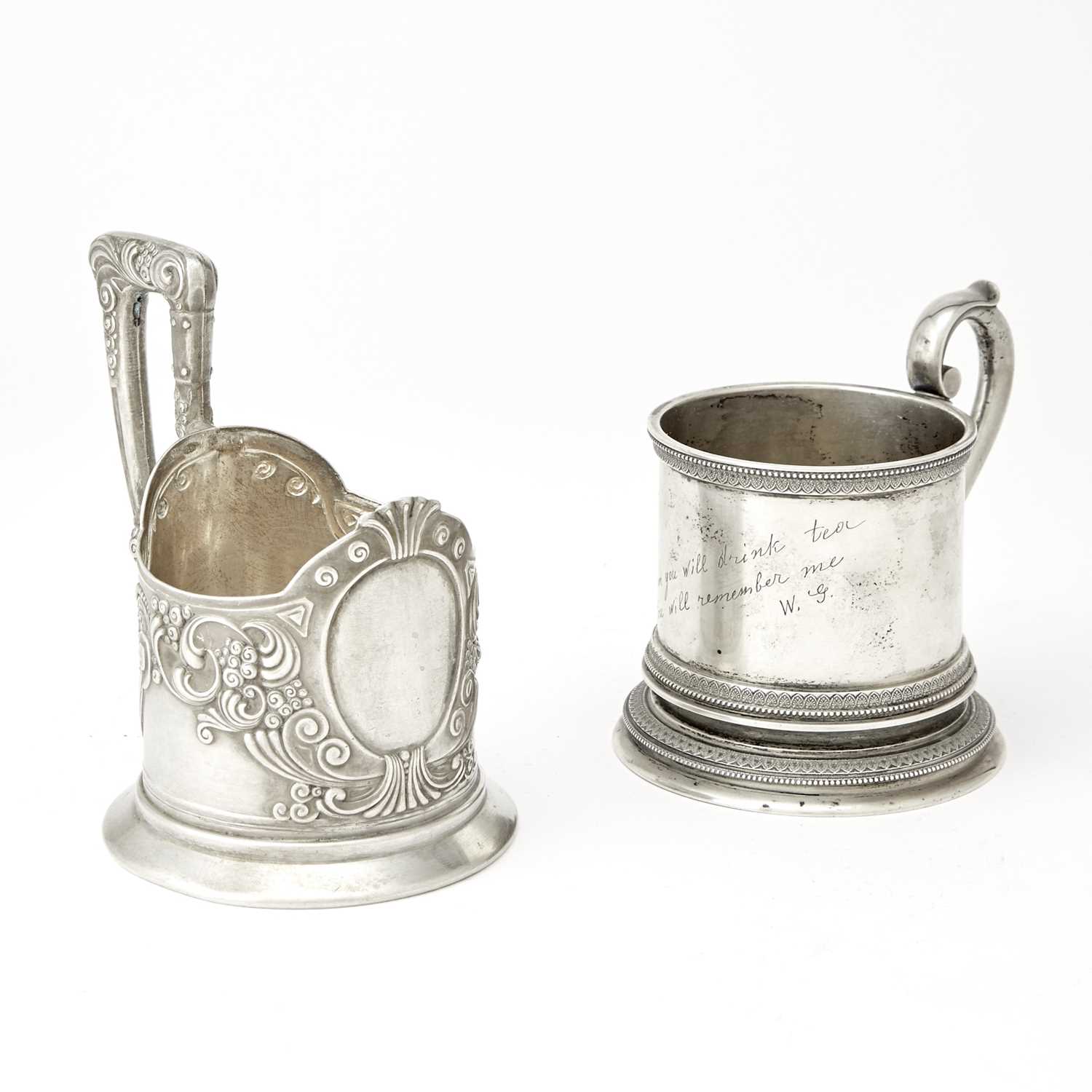 Lot 557 - Two Russian Silver Tea Glass Holders