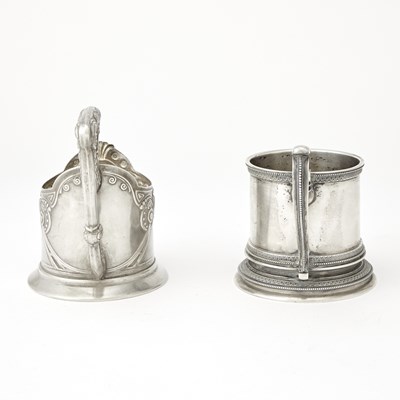 Lot 557 - Two Russian Silver Tea Glass Holders