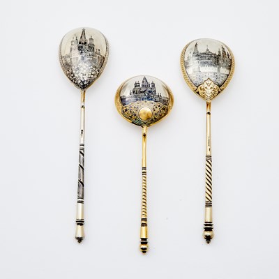 Lot 527 - Three Russian Parcel-Gilt Silver and Niello Spoons