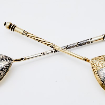 Lot 527 - Three Russian Parcel-Gilt Silver and Niello Spoons