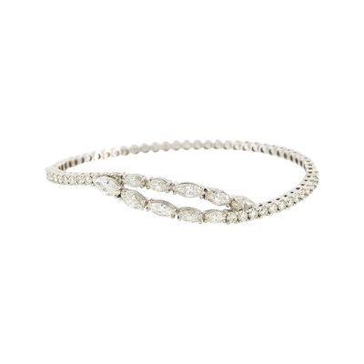 Lot 1118 - White Gold and Diamond Crossover Bangle