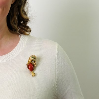 Lot 12 - Two-Color Gold, Coral, Cabochon Emerald and Diamond Duck Clip-Brooch
