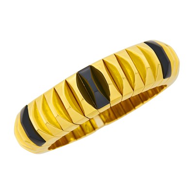 Lot 1005 - Gold and Black Onyx Bangle Bracelet