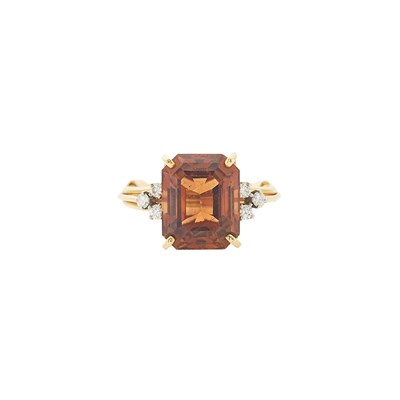 Lot 2155 - Two-Color Gold, Topaz and Diamond Ring