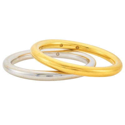 Lot 1007 - Pair of White Gold and Gold Bangle Bracelets