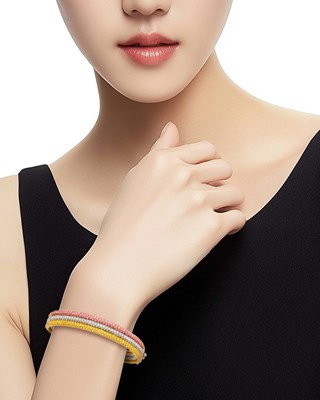 Lot 74 - Tricolor Three Row Gold, Pink and Yellow Sapphire and Diamond Bangle Bracelet