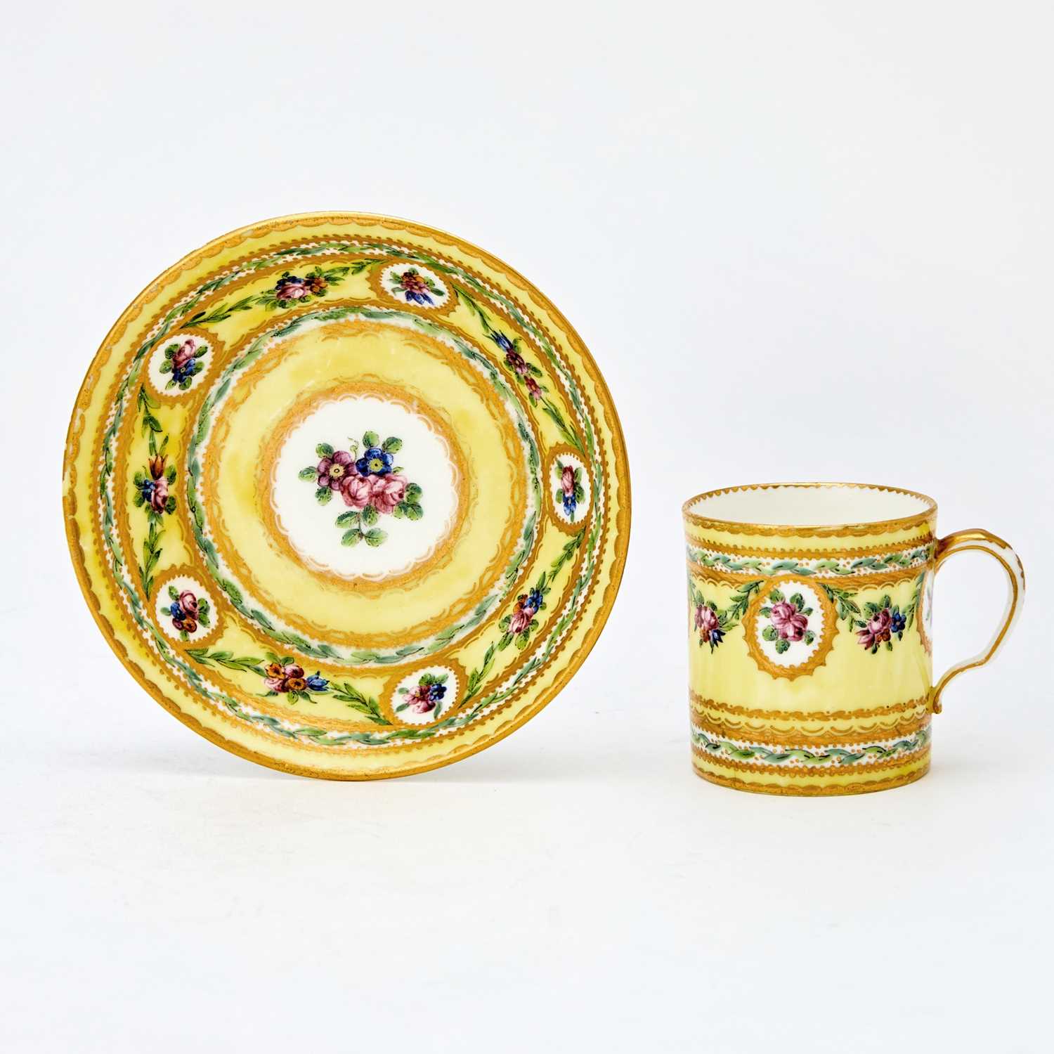 Lot 436 - Sèvres Porcelain Yellow-Ground Teacup and Saucer