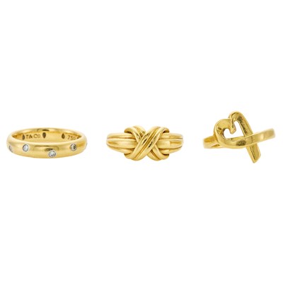 Lot 2016 - Tiffany & Co. Gold 'X' Ring, 'Loving Heart' Ring and 'Etoile' Diamond Band Ring