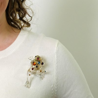 Lot 68 - Seaman Schepps Carved Rock Crystal, Gold and Colored Stone Frog Clip-Brooch