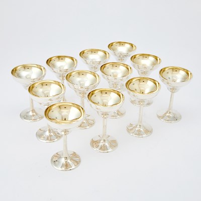 Lot 142 - Set of Twelve Frank W. Smith Sterling Silver and Parcel Gilt Cordials