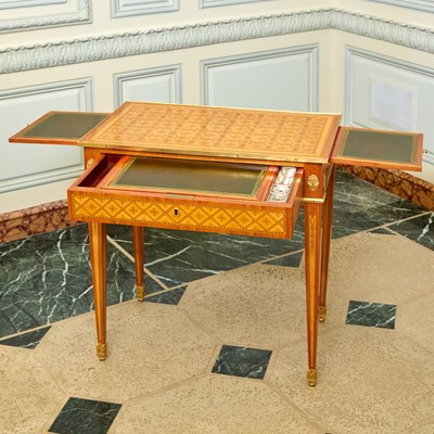 Lot 142 - Louis XVI Gilt Bronze Mounted Tulipwood Parquetry Table à Écrire