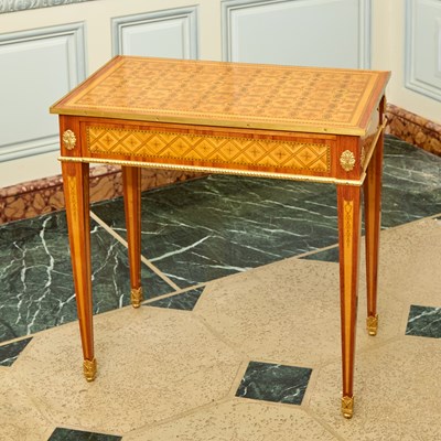 Lot 142 - Louis XVI Gilt Bronze Mounted Tulipwood Parquetry Table à Écrire