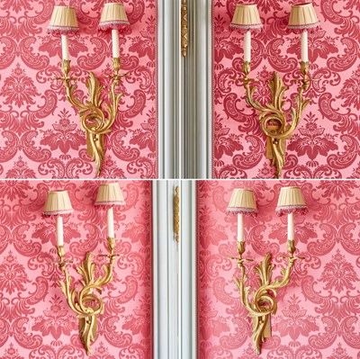 Lot 235 - Set of Four Louis XV Style Gilt Bronze Two-Light Sconces