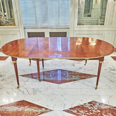 Lot 153 - Louis XVI Style Gilt Bronze Mounted Mahogany Drop Leaf Extension Dining Table