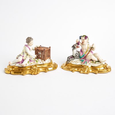 Lot Two Meissen Porcelain Gilt-Bronze Mounted Figures of Putti Emblematic of Taste and Touch