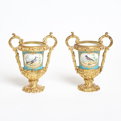 Lot 314 - Pair of Sevres Style Porcelain Gilt-Bronze Mounted Two-Handled Turquoise-Ground Vases