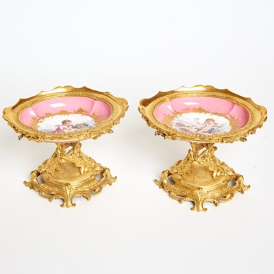 Lot 106 - Pair of Sevres Style Porcelain Pink-Ground Gilt-Bronze Mounted Tazzas