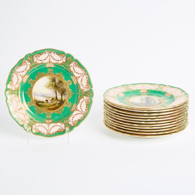 Lot 591 - Twelve Royal Worcester Porcelain Green-Ground Raised Gilt-Decorated Cabinet Plates