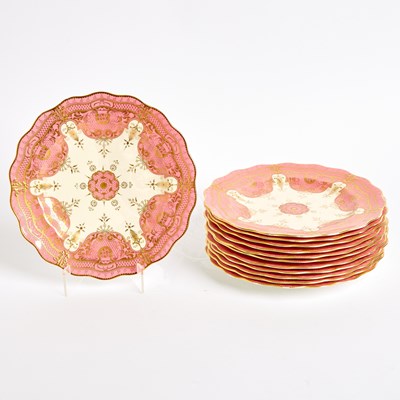 Lot 597 - Twelve Royal Crown Derby Porcelain Gilt-Decorated Pink-Ground Plates