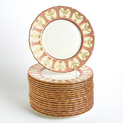 Lot 594 - Eighteen Royal Doulton Pink-Ground Gilt-Decorated Service Plates