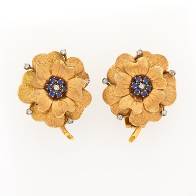 Lot 2397 - Pair of Two-Color Gold, Sapphire and Diamond Flower Earrings