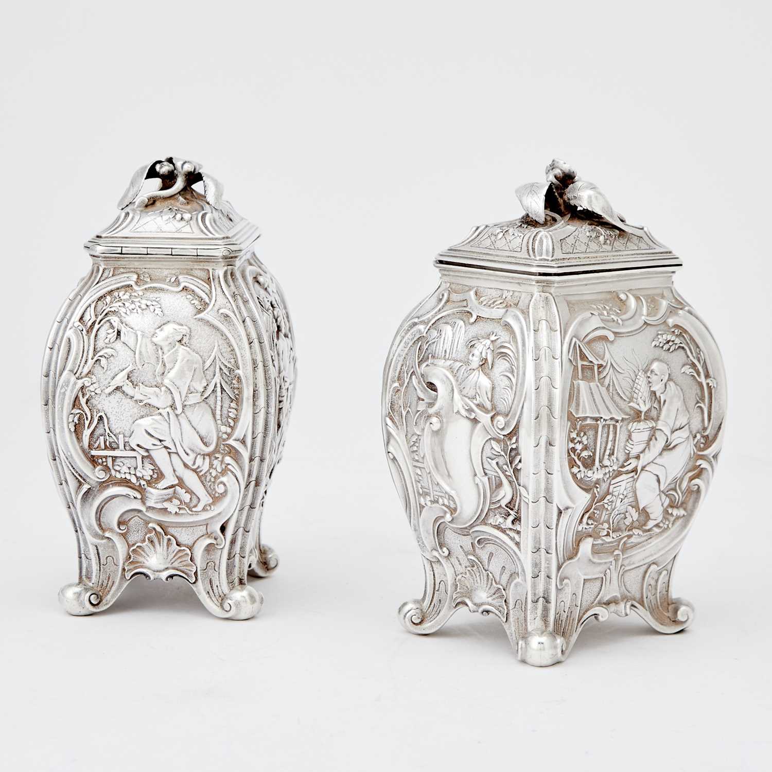 Lot 346 - Pair of Victorian Sterling Silver Chinoserie Tea Caddies