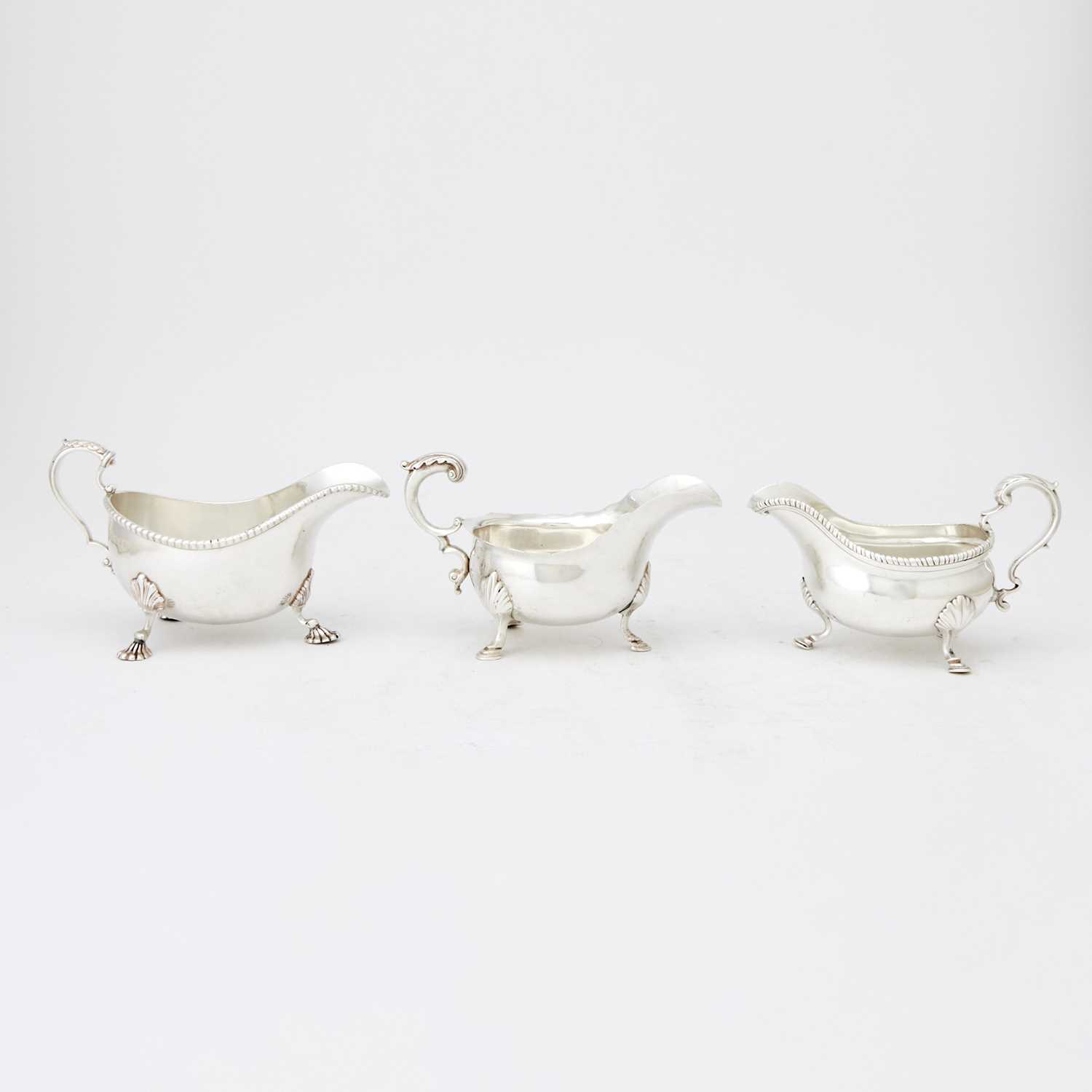 Lot 321 - Three English Sterling Silver Sauceboats