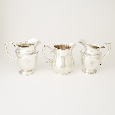 Lot 682 - Three American Sterling Silver Water Pitchers