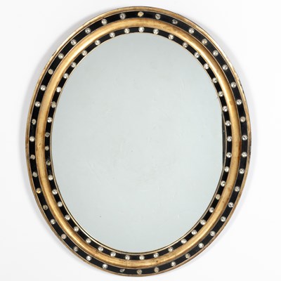 Lot 318 - Irish Regency Oval Gilt and Ebonized Jeweled Mirror